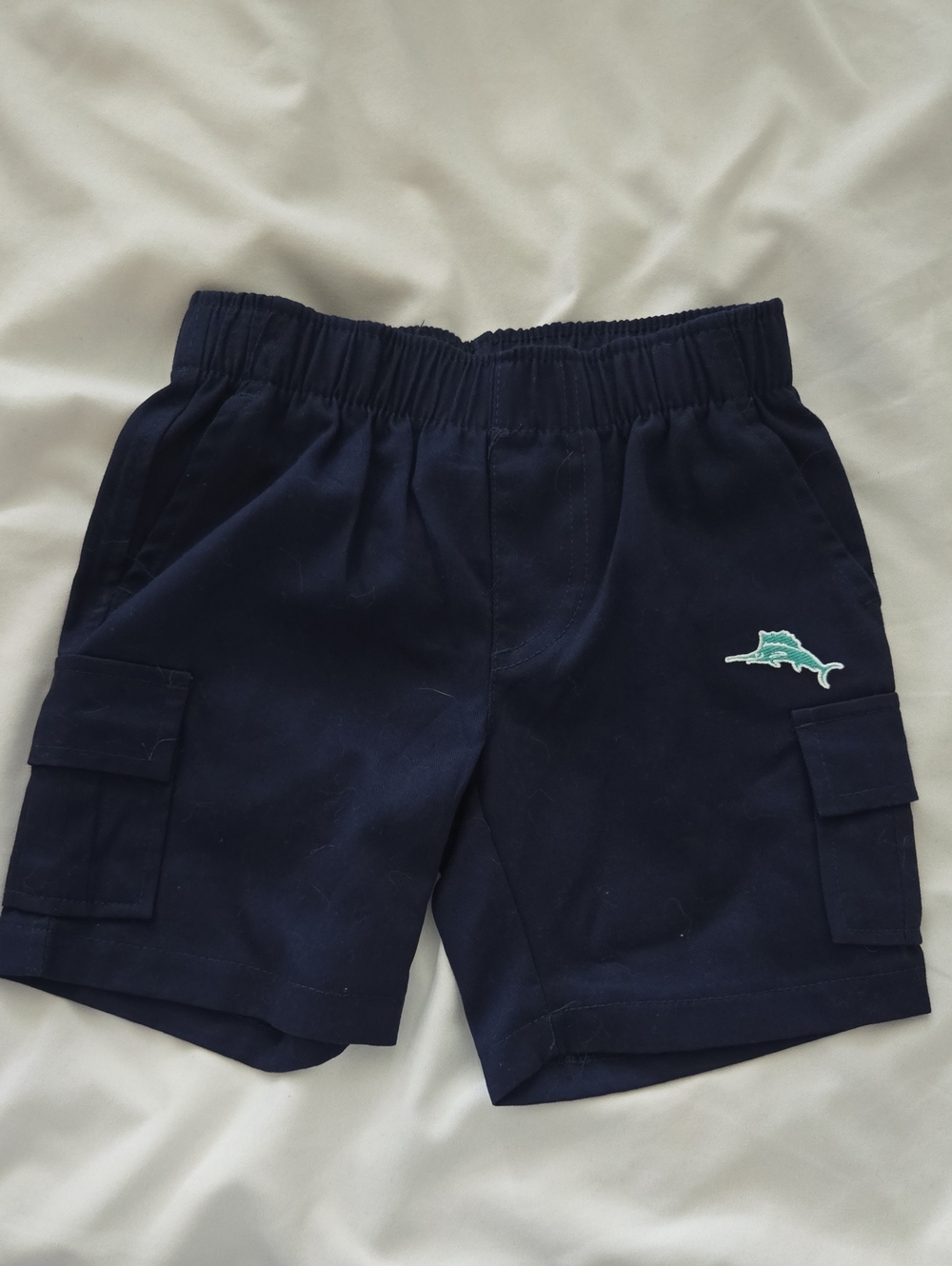 Tommy Bahama Navy Shorts with Teal Dolphin Patch